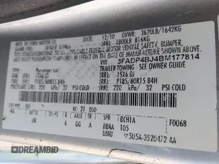 2011 Ford Fiesta SE with VIN 3FADP4BJ4BM177814, listed as a IAAI auction lot 41694964 with 180,565 mi miles. Bid and sale history available at carsss.com. Image 9.
