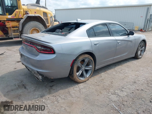 2015 Dodge Charger SXT with VIN 2C3CDXHG2FH768681, listed as a IAAI auction lot 39939245 with Not Provided miles and . Bid and sale history available at DreamBid. Image 4.