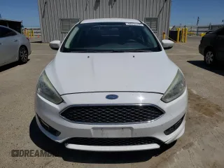 2016 Ford Focus SE with VIN 1FADP3F22GL329241, listed as a Copart auction lot 58095135 with 105,079 mi miles and Salvage title. Bid and sale history available at DreamBid. Image 5.