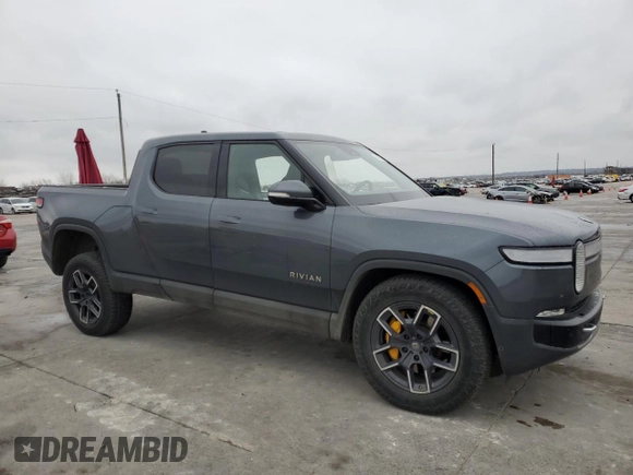 2022 Rivian R1T Launch Edition with VIN 7FCTGAAL7NN002288, listed as a Copart auction lot 43393815 with 46,927 mi miles and Salvage Title. Bid and sale history available at carsss.com. Image 4.