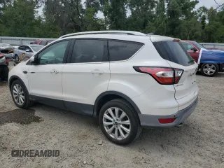 2017 Ford Escape Titanium with VIN 1FMCU0J93HUE01850, listed as a Copart auction lot 56075855 with 116,280 mi miles and Clean Title. Bid and sale history available at DreamBid. Image 2.