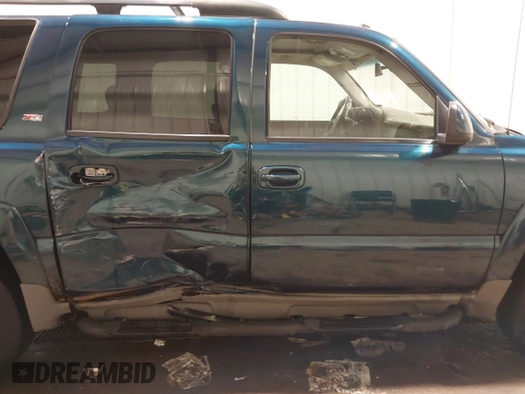 2005 Chevrolet Suburban Z71 with VIN 3GNFK16Z15G279856, listed as a IAAI auction lot 41605091 with 226,136 mi miles and . Bid and sale history available at DreamBid. Image 13.