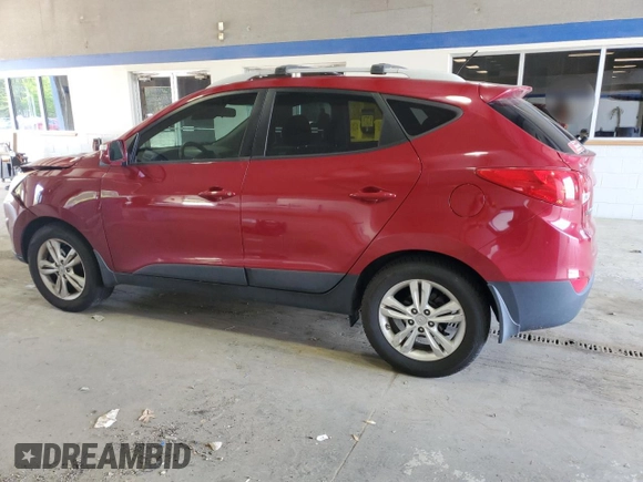 2013 Hyundai Tucson GLS with VIN KM8JU3AC7DU614962, listed as a Copart auction lot 51957675 with 112,942 mi miles and Salvage Title. Bid and sale history available at carsss.com. Image 2.
