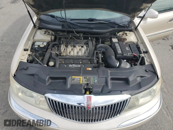 2001 Lincoln Continental z VIN 1LNHM97V71Y711352, wystawiony jako Copart lot #46235305 z przebiegiem 122 786 mil mil oraz Szkoda całkowita • Salvage title. Historia ofert i sprzedaży dostępna na DreamBid. Obrazek 11.