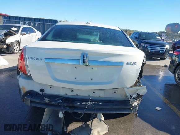 2009 Lincoln MKS z VIN 1LNHM93RX9G618156, wystawiony jako IAAI lot #41054366 z przebiegiem 127 060 mil mil oraz . Historia ofert i sprzedaży dostępna na DreamBid. Obrazek 6.