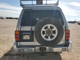 1998 Mitsubishi Montero z VIN JA4MR51R0WJ000921, wystawiony jako Copart lot #56250965 z przebiegiem 181 293 mil mil oraz Szkoda całkowita • Salvage title. Historia ofert i sprzedaży dostępna na DreamBid. Obrazek 6.