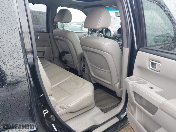 2012 Honda Pilot Touring with VIN 5FNYF4H94CB011228, listed as a IAAI auction lot 41808492 with 231,047 mi miles. Bid and sale history available at carsss.com. Image 8.