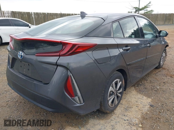 2018 Toyota Prius Plus with VIN JTDKARFP6J3078362, listed as a IAAI auction lot 42021835 with 61,170 mi miles and . Bid and sale history available at DreamBid. Image 4.