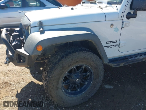 2017 Jeep Wrangler Unlimited Sport with VIN 1C4BJWDG4HL502861, listed as a IAAI auction lot 40895010 with 62,970 mi miles. Bid and sale history available at carsss.com. Image 6.