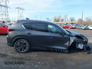 2023 Mazda CX-5 2.5 S Premium Package with VIN JM3KFBDM2P0246520, listed as a IAAI auction lot 41100226 with 9,537 mi miles. Bid and sale history available at carsss.com. Image 13.