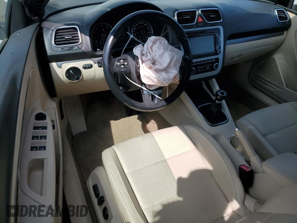 2011 Volkswagen Eos with VIN WVWAW7AH7BV003659, listed as a Copart auction lot 52494904 with 122,927 mi miles and Salvage Title. Bid and sale history available at DreamBid. Image 8.
