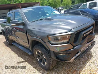 2022 Ram 1500 Rebel with VIN 1C6SRFLT3NN282689, listed as a IAAI auction lot 42472175 with 58,163 mi miles and . Bid and sale history available at DreamBid. Image 1.