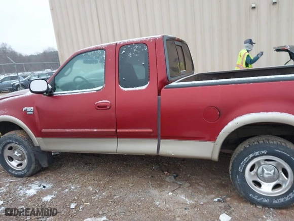2000 Ford F-150 XL with VIN 1FTRX18L6YNA92785, listed as a IAAI auction lot 41618404 with 136,991 mi miles. Bid and sale history available at carsss.com. Image 14.