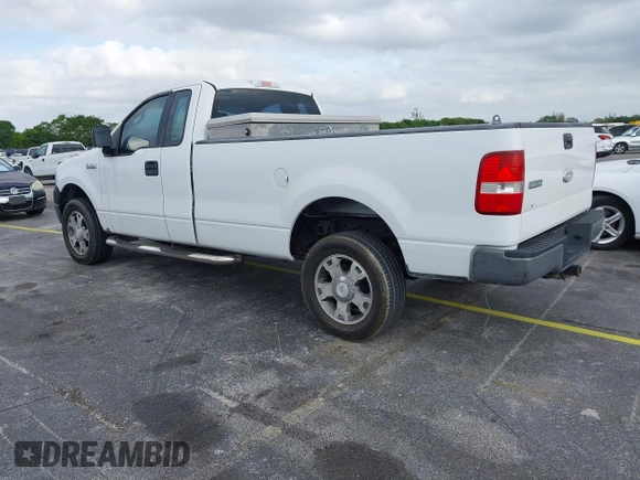2005 Ford F-150 XL with VIN 1FTRF14W35NB42167, listed as a IAAI auction lot 41990938 with 256,964 mi miles. Bid and sale history available at carsss.com. Image 3.