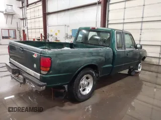 1999 Mazda B-Series Truck SE z VIN 4F4YR16C0XTM43278, wystawiony jako IAAI lot #41687429 z przebiegiem 288 858 mil mil oraz . Historia ofert i sprzedaży dostępna na DreamBid. Obrazek 4.