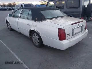 2004 Cadillac DeVille z VIN 1G6KD54Y14U172470, wystawiony jako IAAI lot #41803278 z przebiegiem 115 056 mil mil oraz . Historia ofert i sprzedaży dostępna na DreamBid. Obrazek 3.