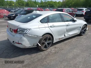 2019 BMW 4 Series 430i xDrive z VIN WBA4J3C55KBL08387, wystawiony jako IAAI lot #42248405 z przebiegiem 115 017 mil mil oraz . Historia ofert i sprzedaży dostępna na DreamBid. Obrazek 4.
