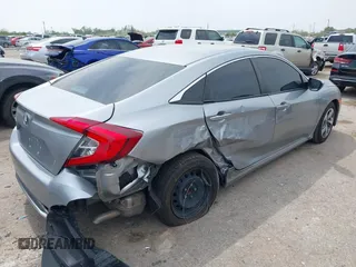 2019 Honda Civic LX with VIN 19XFC2F66KE026931, listed as a IAAI auction lot 41885137 with 55,057 mi miles and . Bid and sale history available at DreamBid. Image 4.