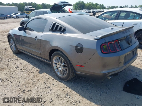 2014 Ford Mustang V6 with VIN 1ZVBP8AM3E5225590, listed as a IAAI auction lot 42148999 with 94,911 mi miles and . Bid and sale history available at DreamBid. Image 3.