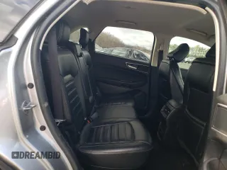 2020 Ford Edge SEL z VIN 2FMPK4J95LBA29912, wystawiony jako Copart lot #82968534 z przebiegiem 104 083 mil mil oraz Szkoda całkowita • Salvage title. Historia ofert i sprzedaży dostępna na DreamBid. Obrazek 12.