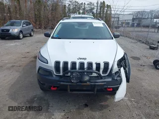 2014 Jeep Cherokee Trailhawk with VIN 1C4PJMBS5EW240375, listed as a IAAI auction lot 41806725 with 127,705 mi miles. Bid and sale history available at carsss.com. Image 12.