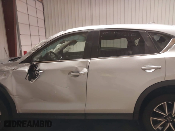2018 Mazda CX-5 Touring with VIN JM3KFBCM7J0347769, listed as a IAAI auction lot 41611985 with 158,579 mi miles. Bid and sale history available at carsss.com. Image 15.