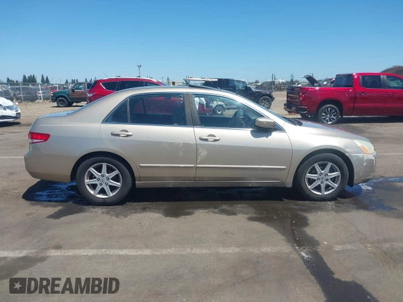 2003 Honda Accord EX z VIN 1HGCM66523A023920, wystawiony jako IAAI lot #42339108 z przebiegiem 165 553 mil mil oraz . Historia ofert i sprzedaży dostępna na DreamBid. Obrazek 13.
