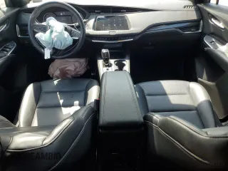 2023 Cadillac XT4 AWD Sport с VIN 1GYFZFR46PF209320, выставлен на аукционе Copart как лот 55662565 с пробегом 25 665 миль миль и Списание • Salvage title. История ставок и продаж доступна на DreamBid. Изображение 8.