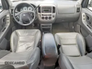 2004 Ford Escape XLT z VIN 1FMYU03124KB41332, wystawiony jako Copart lot #62335725 z przebiegiem Nie podano mil oraz Czysty tytuł • Clean title. Historia ofert i sprzedaży dostępna na DreamBid. Obrazek 8.