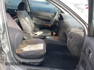 2002 Volkswagen Passat GLX z VIN WVWRH63B02P122142, wystawiony jako IAAI lot #42282094 z przebiegiem 222 613 mil mil oraz . Historia ofert i sprzedaży dostępna na DreamBid. Obrazek 5.
