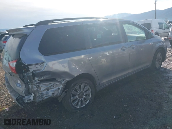 2017 Toyota Sienna LE with VIN 5TDJZ3DC9HS168079, listed as a IAAI auction lot 41175845 with 98,585 mi miles. Bid and sale history available at carsss.com. Image 4.
