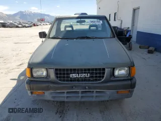 1994 Isuzu Pickup S z VIN JAACL11L2R7221226, wystawiony jako Copart lot #59027295 z przebiegiem 129 494 mil mil oraz Tytuł czysty. Historia ofert i sprzedaży dostępna na DreamBid. Obrazek 5.