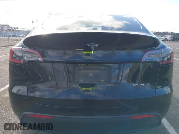 2022 Tesla Model Y Long Range with VIN 7SAYGAEE4NF522330, listed as a IAAI auction lot 42046691 with 59,980 mi miles and . Bid and sale history available at carsss.com. Image 15.