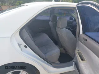 2002 Toyota Camry XLE z VIN 4T1BF32K42U007564, wystawiony jako IAAI lot #42534864 z przebiegiem 133 850 mil mil oraz . Historia ofert i sprzedaży dostępna na DreamBid. Obrazek 8.