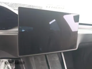 2021 Tesla Model S Plaid z VIN 5YJSA1E6XMF429436, wystawiony jako IAAI lot #41826114 z przebiegiem Nie podano mil oraz . Historia ofert i sprzedaży dostępna na DreamBid. Obrazek 17.