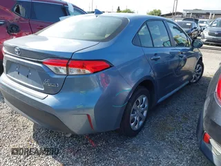 2024 Toyota Corolla Hybrid LE with VIN JTDBCMFE1RJ032747, listed as a IAAI auction lot 42063478 with 13,655 mi miles. Bid and sale history available at carsss.com. Image 4.