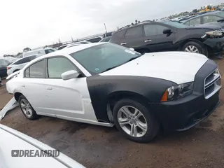 2013 Dodge Charger SE with VIN 2C3CDXBG1DH742921, listed as a IAAI auction lot 41765001 with 196,783 mi miles and . Bid and sale history available at DreamBid. Image 14.