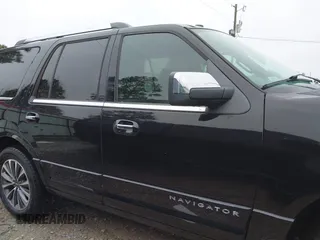 2017 Lincoln Navigator Select z VIN 5LMJJ2HT6HEL01424, wystawiony jako IAAI lot #41908737 z przebiegiem 87 287 mil mil oraz . Historia ofert i sprzedaży dostępna na DreamBid. Obrazek 14.
