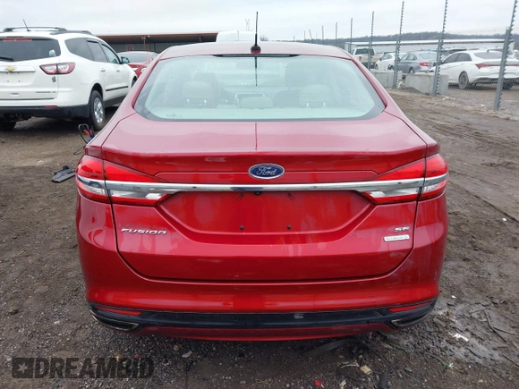 2017 Ford Fusion SE z VIN 3FA6P0H98HR175087, wystawiony jako IAAI lot #41557481 z przebiegiem 103 752 mil mil oraz . Historia ofert i sprzedaży dostępna na DreamBid. Obrazek 16.