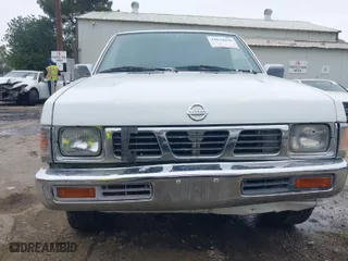 1995 Nissan Trucks 2WD with VIN 1N6SD11S5SC362519, listed as a IAAI auction lot 42034630 with 239,479 mi miles. Bid and sale history available at carsss.com. Image 6.