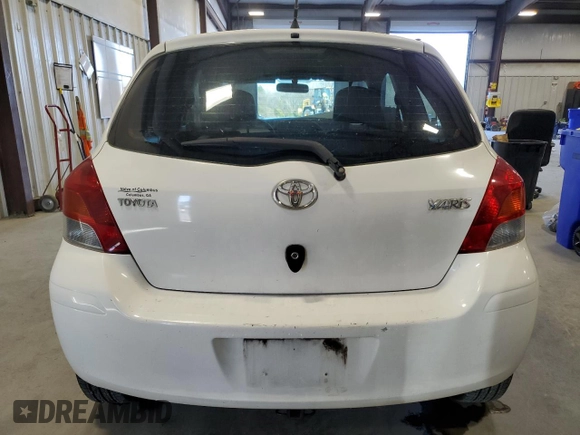 2011 Toyota Yaris with VIN JTDJT4K30B5334173, listed as a Copart auction lot 87031624 with 179,280 mi miles and Salvage Title. Bid and sale history available at carsss.com. Image 6.