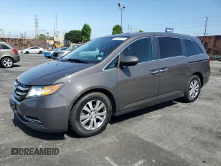 2015 Honda Odyssey EX-L z VIN 5FNRL5H69FB002134, wystawiony jako Copart lot #59148215 z przebiegiem 126 880 mil mil oraz Szkoda całkowita • Salvage title. Historia ofert i sprzedaży dostępna na DreamBid. Obrazek 1.
