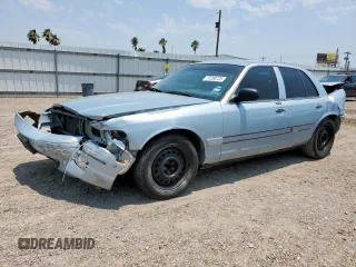 2004 Ford Crown Victoria LX z VIN 2FAFP74W54X184815, wystawiony jako Copart lot #57280725 z przebiegiem 294 513 mil mil oraz Szkody całkowita. Historia ofert i sprzedaży dostępna na DreamBid. Obrazek 1.