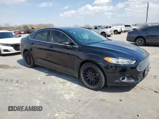 2016 Ford Fusion SE with VIN 3FA6P0HD4GR365522, listed as a Copart auction lot 48703705 with 193,700 mi miles and Salvage Title. Bid and sale history available at DreamBid. Image 4.