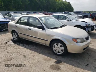 2003 Mazda Protege DX with VIN JM1BJ225X30107443, listed as a Copart auction lot 54777625 with 283,760 mi miles and Clean Title. Bid and sale history available at DreamBid. Image 4.