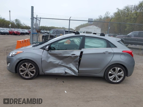2014 Hyundai Elantra GT with VIN KMHD35LH6EU165019, listed as a IAAI auction lot 42016057 with 121,794 mi miles. Bid and sale history available at carsss.com. Image 14.
