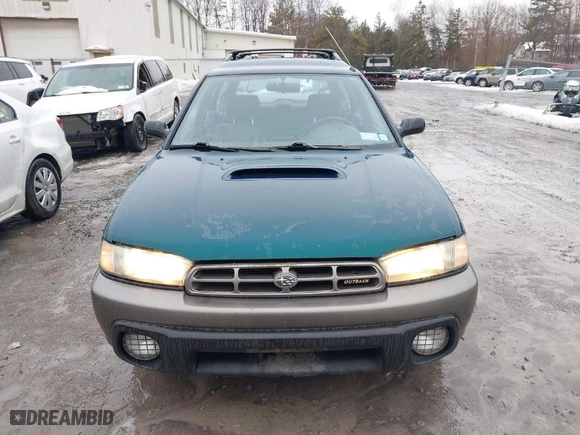 1997 Subaru Legacy Wagon Outback with VIN 4S3BG685XV7654378, listed as a IAAI auction lot 41666575 with 248,484 mi miles. Bid and sale history available at carsss.com. Image 6.