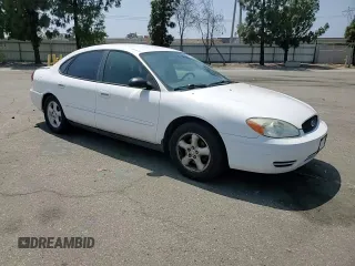 2006 Ford Taurus SE with VIN 1FAFP53U96A104173, listed as a Copart auction lot 59624865 with 145,005 mi miles and Salvage title. Bid and sale history available at DreamBid. Image 14.