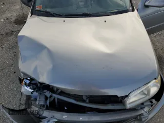 2001 Nissan Sentra GXE z VIN 3N1CB51D51L514813, wystawiony jako Copart lot #49574495 z przebiegiem 93 849 mil mil oraz Szkoda całkowita • Salvage title. Historia ofert i sprzedaży dostępna na DreamBid. Obrazek 13.