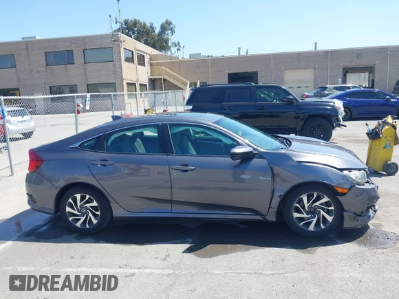 2018 Honda Civic EX с VIN 2HGFC2F7XJH575402, выставлен на аукционе IAAI как лот 42391677 с пробегом 95 623 миль миль и . История ставок и продаж доступна на DreamBid. Изображение 14.
